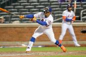 Francisco Lindor #12 of the New York Mets grounds out