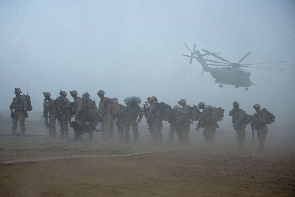 US Marines wait for helicopter transport as part of Operation Khanjar at Camp Dwyer in Helmand Province in Afghanistan on July 2, 2009.