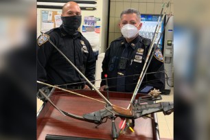 NYPD officers responded to a 911 call about a FedEx employee being chased down the street by a man with a bow and arrow.