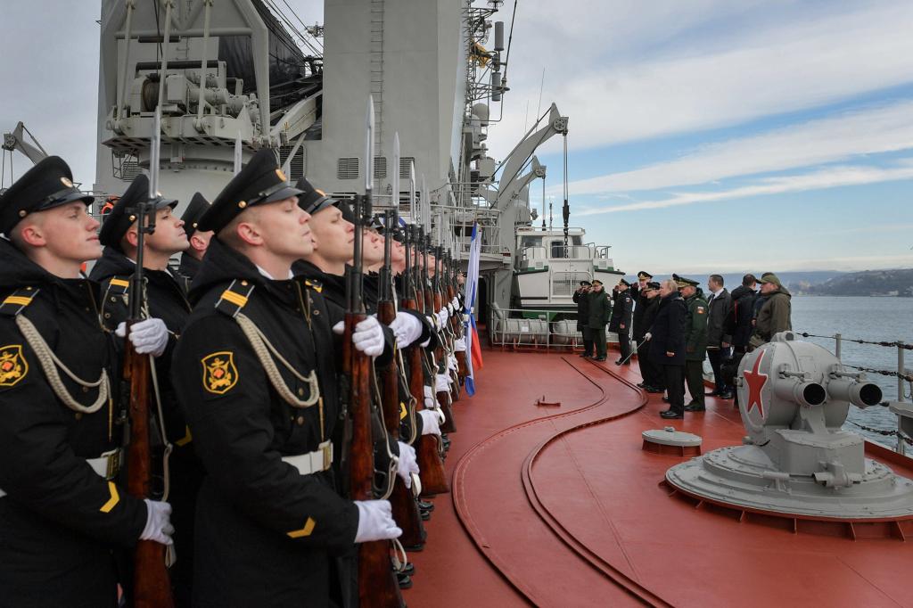 Russian President Vladimir Putin attends joint drills of the Northern and Black sea fleets on board the Russian guided missile cruiser Marshal Ustinov in the Black Sea port of Sevastopol, Crimea on Jan. 9, 2020.