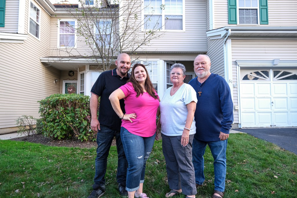 Rich, Manda, Diane and Paul in front of the family home.