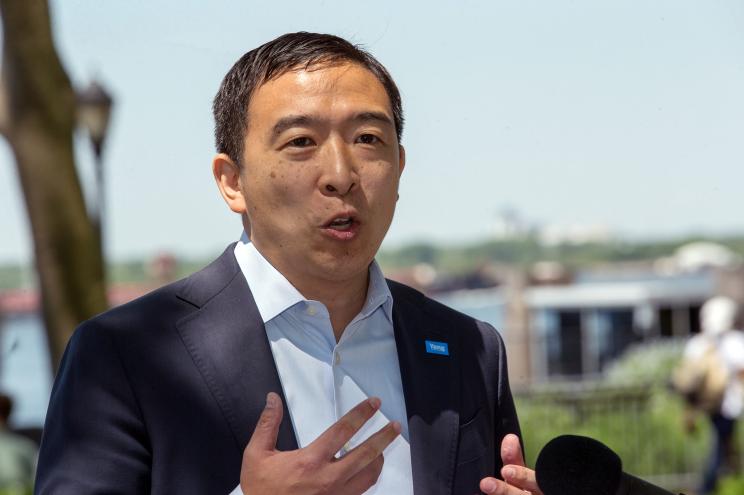 Andrew Yang holds a razor-thin lead over Eric Adams in the latest mayoral poll.