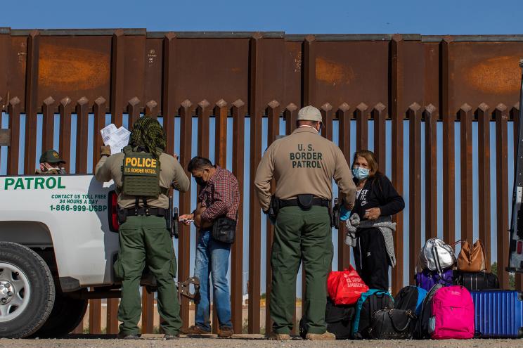 An asylum seeker from Colombia injects insulin after he turned himself in to US Border Patrol agents on May 13, 2021 in Yuma, Arizona.