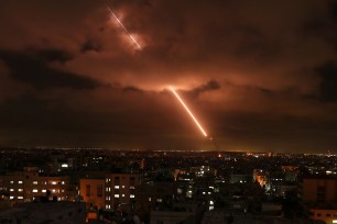 srael's Iron Dome anti-missile system intercept rockets launched from the Gaza Strip towards Israel, as seen from Gaza strip.