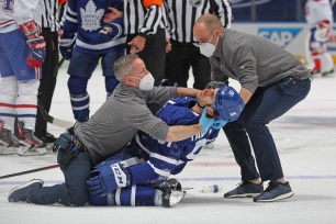 John Tavares is injured against the Montreal Canadiens.