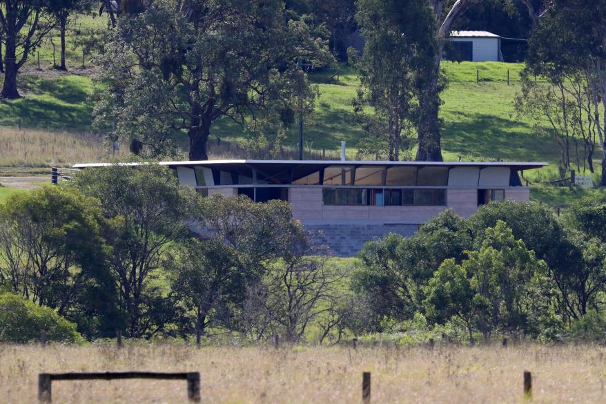 The house is seen closer up in this photo.