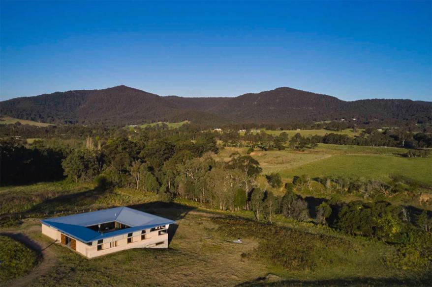 The courtyard-style house has sweeping views of the mountains outside Sydney.