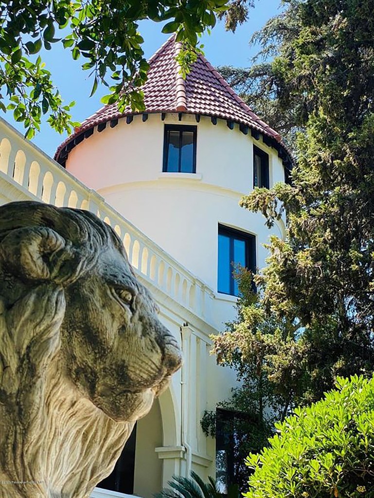 Though the red-roofed white mansion with multiple turrets offers 360-degree views of San Gabriel Valley on a 2.5-acre hill, the property had trouble selling.