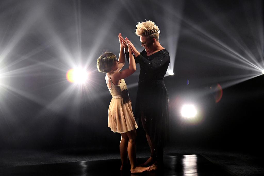 Pink high-fives daughter Willow after their Billboard Music Awards performance.