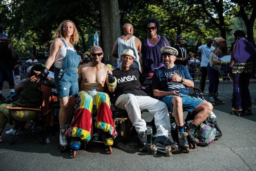 Original members of pose for a portrait at the Central Park Dance Skaters Association “Purple Rain” event at the Central Park Skate Circle, a popular hangout for roller skaters since 1978.