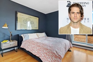 An inset of Aaron Tveit over his bedroom.