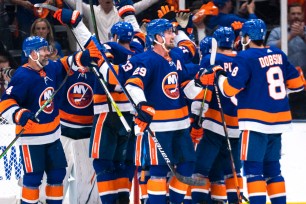 The Islanders celebrate after their series-clinching 6-2 Game 6 win over the Bruins.