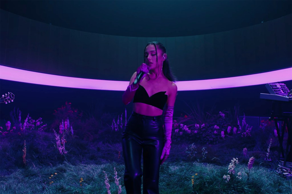 Pop singer Ariana Grande stunned once again with a sensual live performance video of her hit song, “POV.”