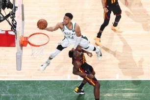 Giannis Antetokounmpo #34 of the Milwaukee Bucks shoots the ball