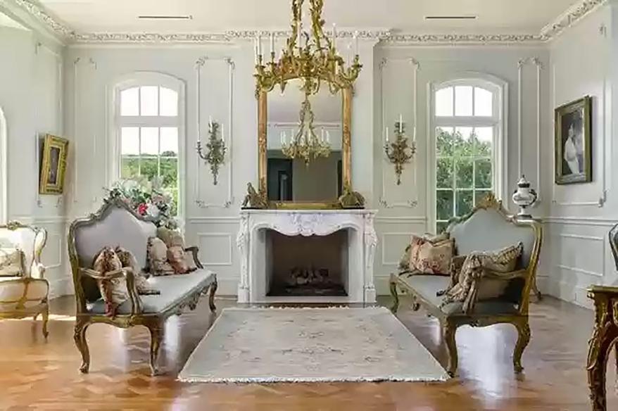 Two sitting rooms feature decadent crown molding.