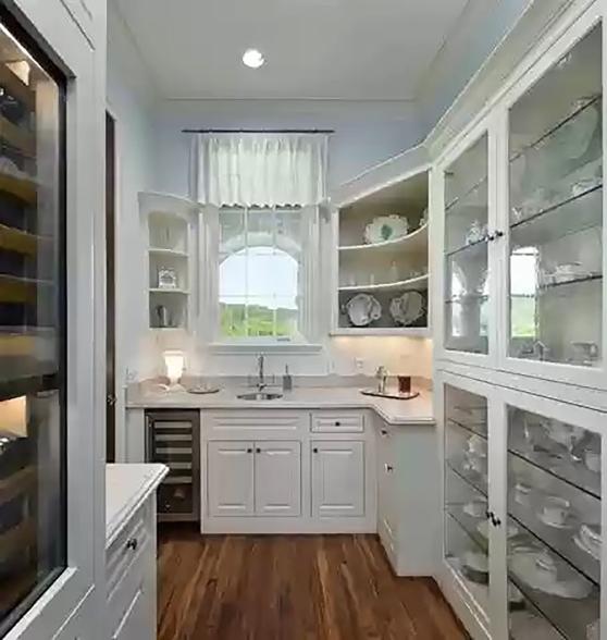 This pantry provides extra storage to the kitchen.