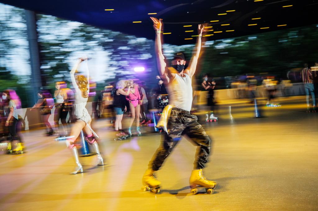 Tim Young, 34, at Dreamland Roller Rink's "Roller Disco" event.