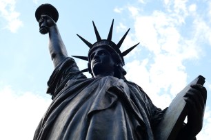 A 2.83 meter original replica of the Statue of Liberty is seen in front of the Musee des Arts et Metiers in Paris before it departs for Ellis Island in New York to arrive on Independence Day, France, June 2, 2021