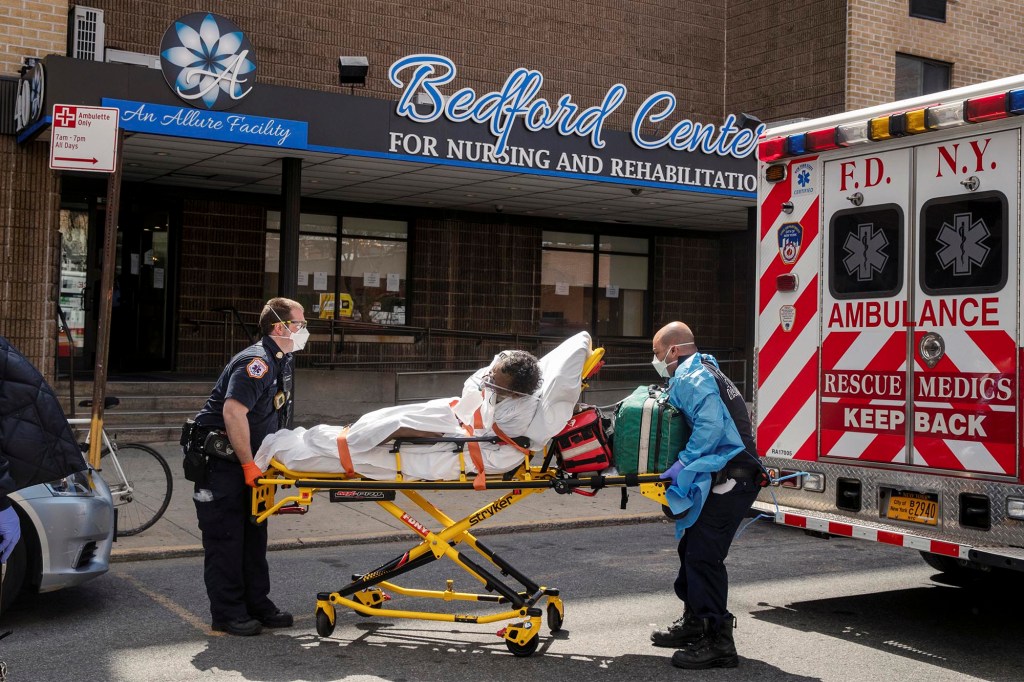 A nursing home patient being lifted onto an ambulance during the COVID-19 pandemic in Brooklyn on April 16, 2020.