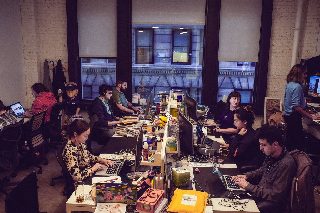 Deadspin employees at work in their Manhattan office in 2018 -- before the turmoil that took place the following year