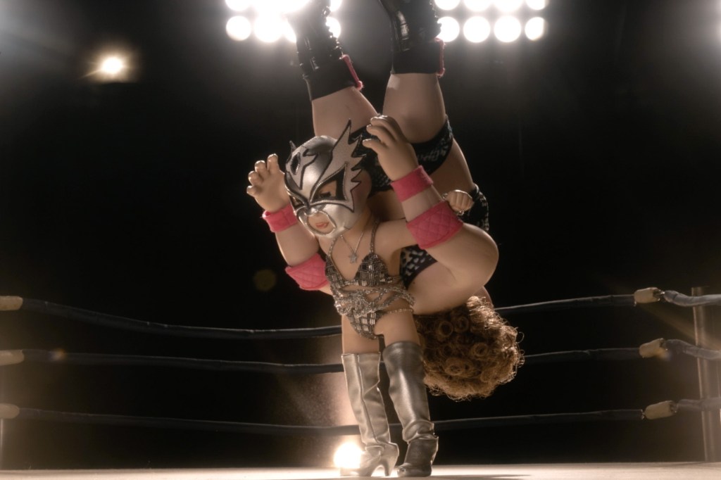 Photo of baby-doll wrestlers Space Bitch and Lady Andrea the Giant in a scene from "Ultra City Smiths."