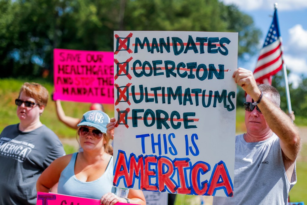 Protesters at a 'Stop the Mandate' protest in Georgia after a healthcare facility started mandating the COVID-19 vaccine.