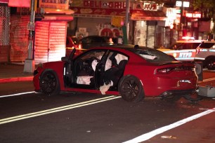 A woman was killed and her husband injured after a Dodge Charger hopped the curb and hit them both in Crown Heights.