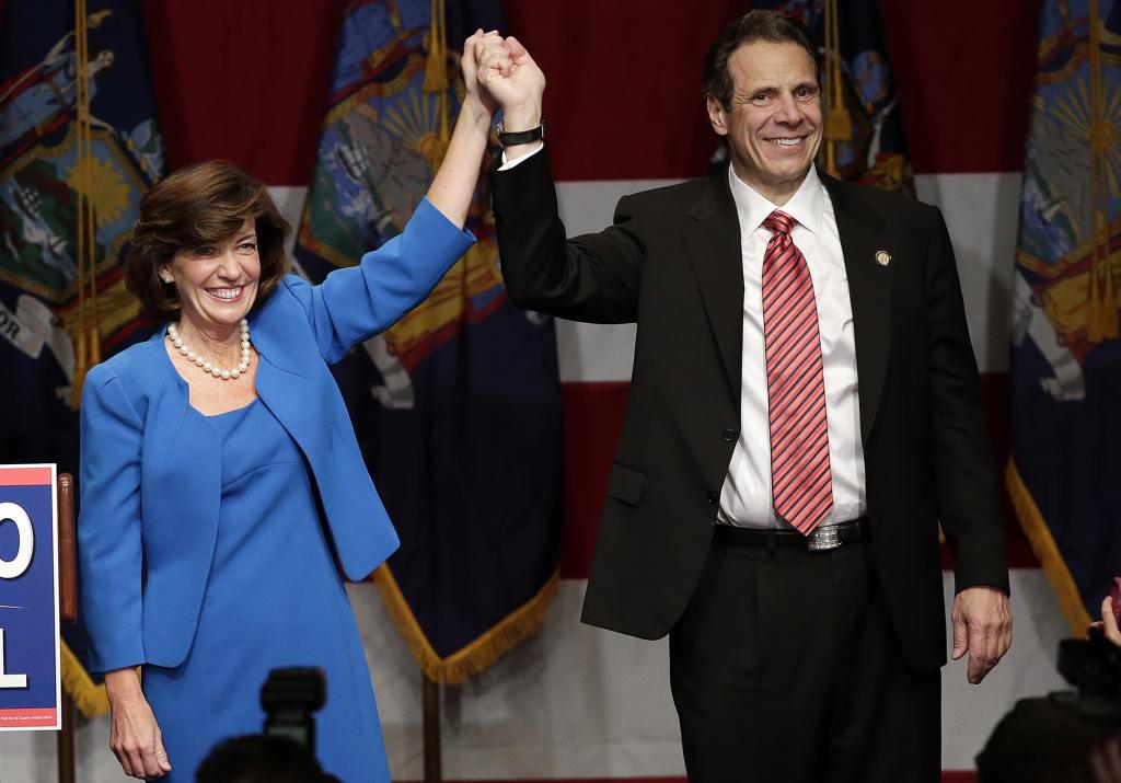 New York Governor Andrew Cuomo and Lieutenant Governor Kathy Hochul celebrate on the stage after Cuomo is Re-elected as New York Governor at the Sheraton New York Times Square Hotel in New York City on November 4, 2014.