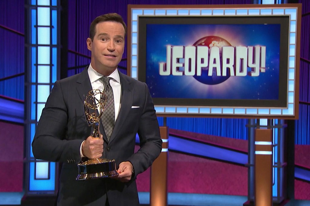 Mike Richards accepts the award for Outstanding Game Show for Jeopardy! 