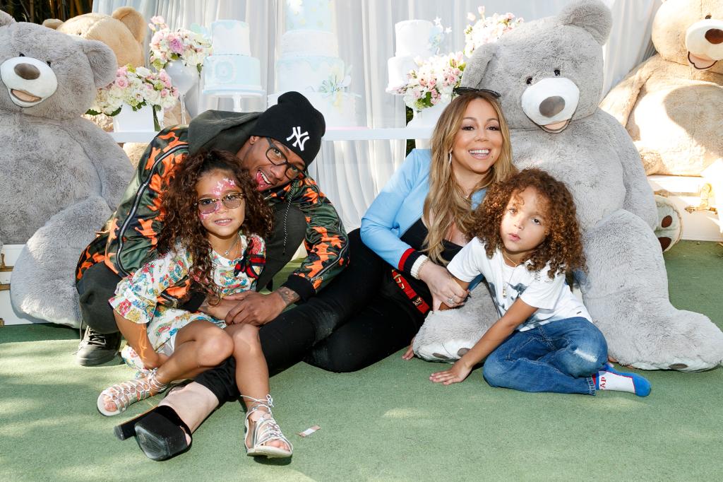 Cannon with the 10-year-old twins, Monroe (left) and Moroccan, that he shares pop diva Mariah Carey.