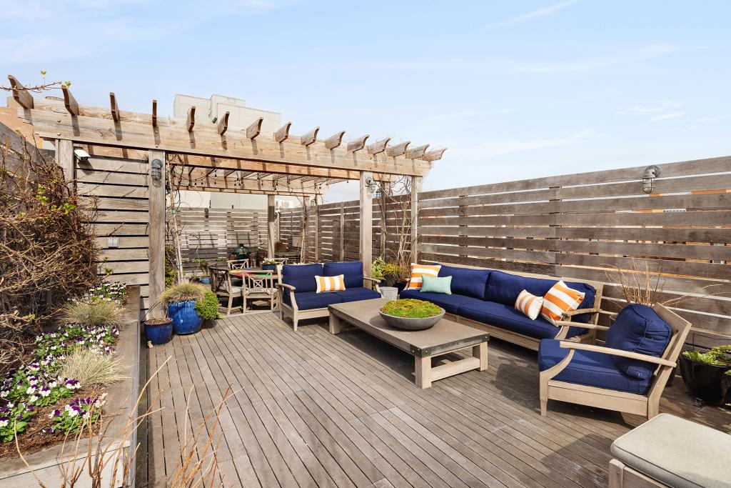 Outside, the home has 2,000 square feet of terraces, gardens and decks with a Jacuzzi, a pergola and a barbecue.