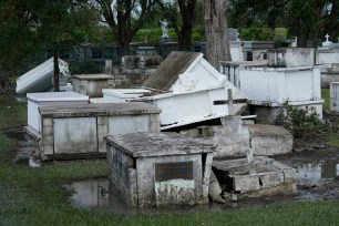 In the aftermath Hurricane Ida damage to a cemetery is seen Wednesday, Sept. 1, 2021, in Plaquemines Parish, Louisiana.