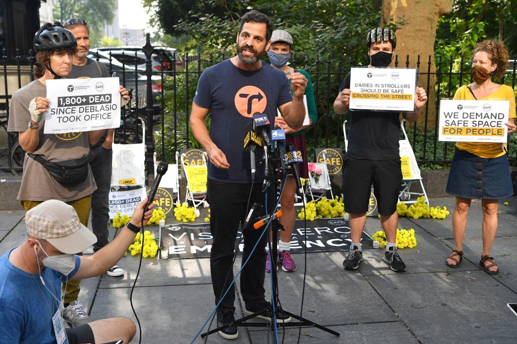 Danny Harris, executive director of Transportation Alternatives, gathers with advocates to install eight white ghost strollers at City Hall in protest of Mayor Bill de Blasio’s traffic policies on September 14, 2021