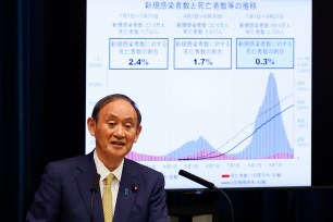 Japan's Prime Minister Yoshihide Suga speaks during a press conference at the prime minister's official residence, Tuesday, Sept. 28, 2021, in Tokyo.