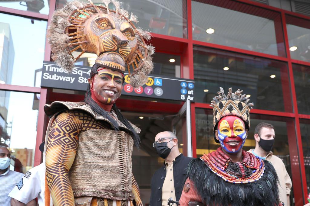 The cast in the hit Broadway musical the Lion King preforms for the general public on West 44th Street and 7th Avenue in Manhattan in-the-wake of the reopening of Broadway shows tonight.