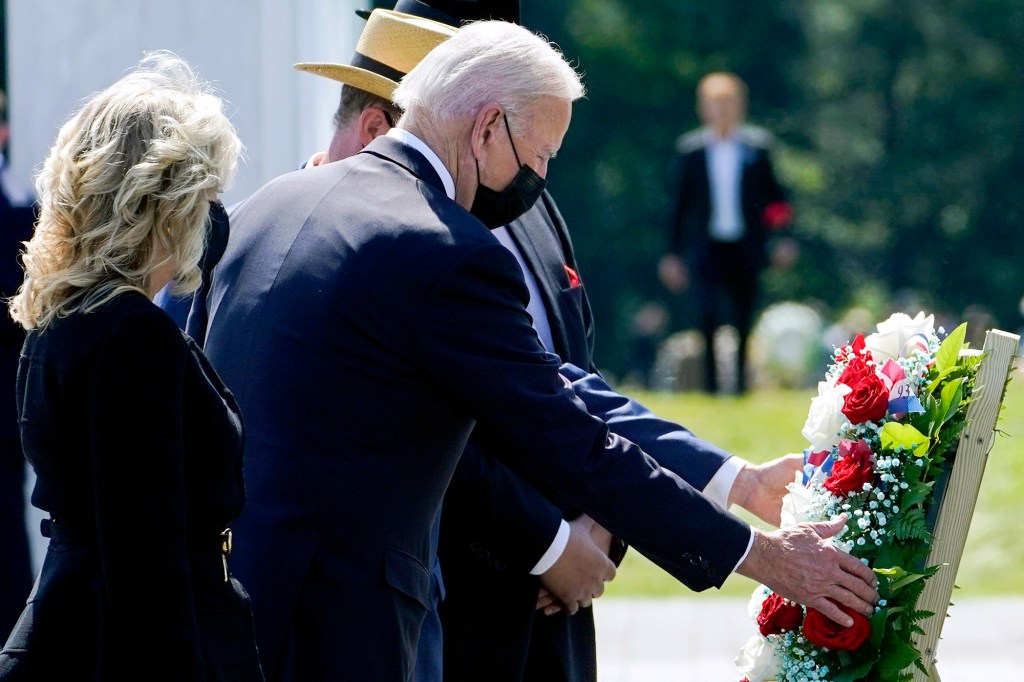 President Joe Biden and first lady Jill Biden lay a wreath at the Wall of Names during a visit to the Flight 93 National Memorial in Shanksville, Pa.,