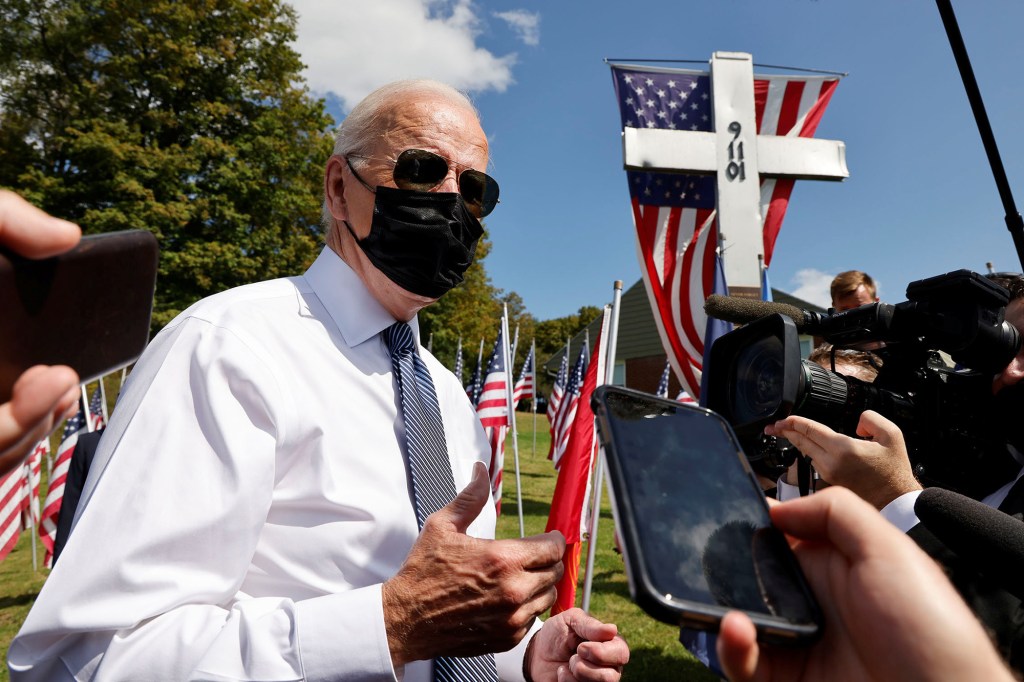 U.S. President Joe Biden talks with reporters outside the Shanksville volunteer fire station.