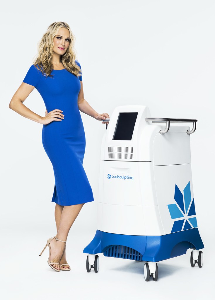 Molly Sims with a CoolSculpting machine.