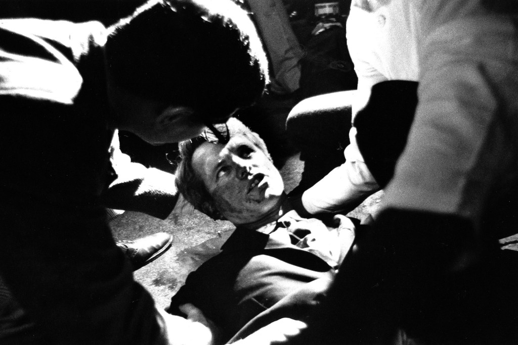Presidential candidate Robert F. Kennedy lies on the floor at the Ambassador Hotel in Los Angeles moments after he was fatally shot in the head by Sirhan Sirhan.