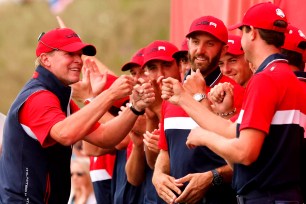 Steve Stricker celebrates with US players after their Ryder Cup win on Sept. 26, 2021.