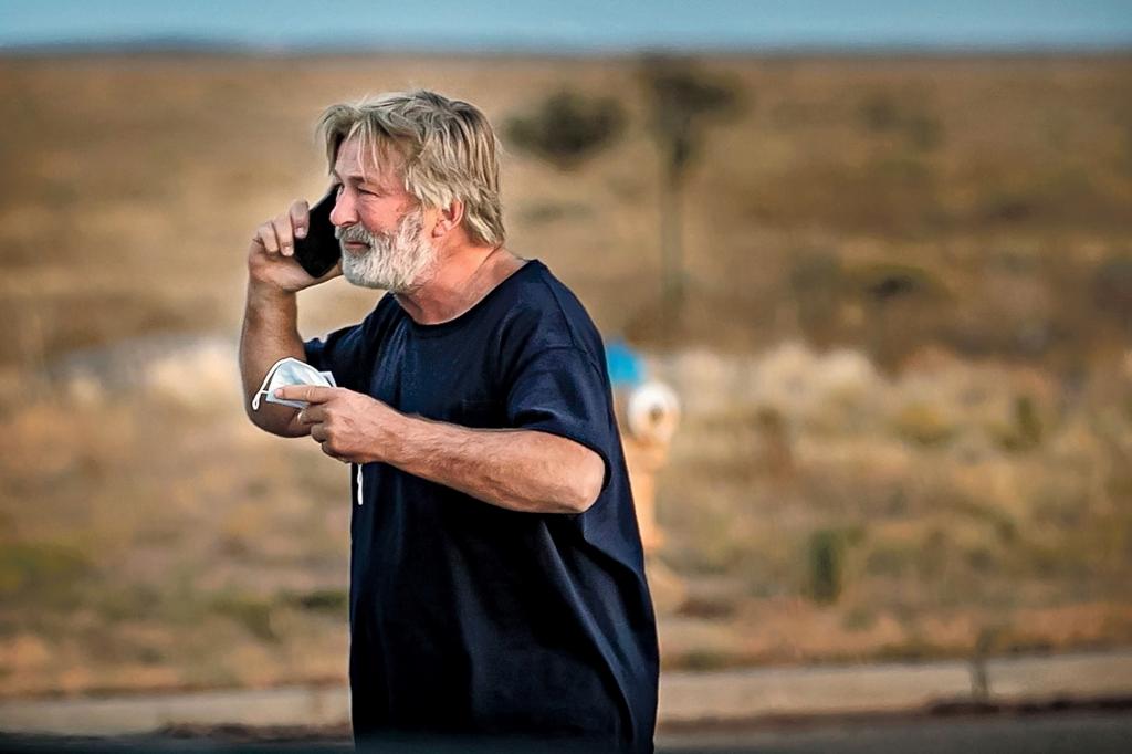 A distraught Alec Baldwin lingers in the parking lot outside the Santa Fe County Sheriff's offices on Camino Justicia after being questioned on Oct. 20, 2021 about a shooting when a prop gun misfired earlier in the day on a local movie set.