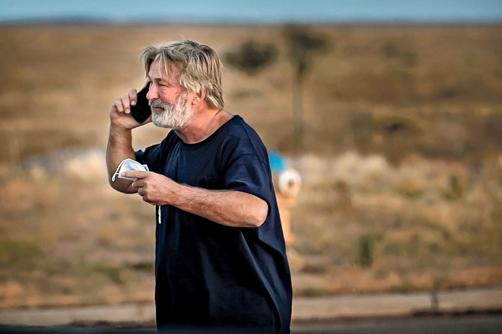 A distraught Alec Baldwin lingers in the parking lot outside the Santa Fe County Sheriff's offices on Camino Justicia after being questioned on Oct. 20, 2021 about a shooting when a prop gun misfired earlier in the day on a local movie set.
