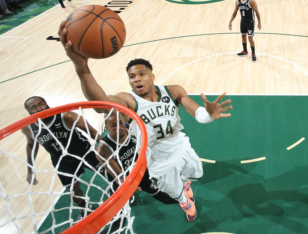 Giannis Antetokounmpo, who scored 32 points, goes up for a layup during the Nets' 127-104 loss to the Bucks.