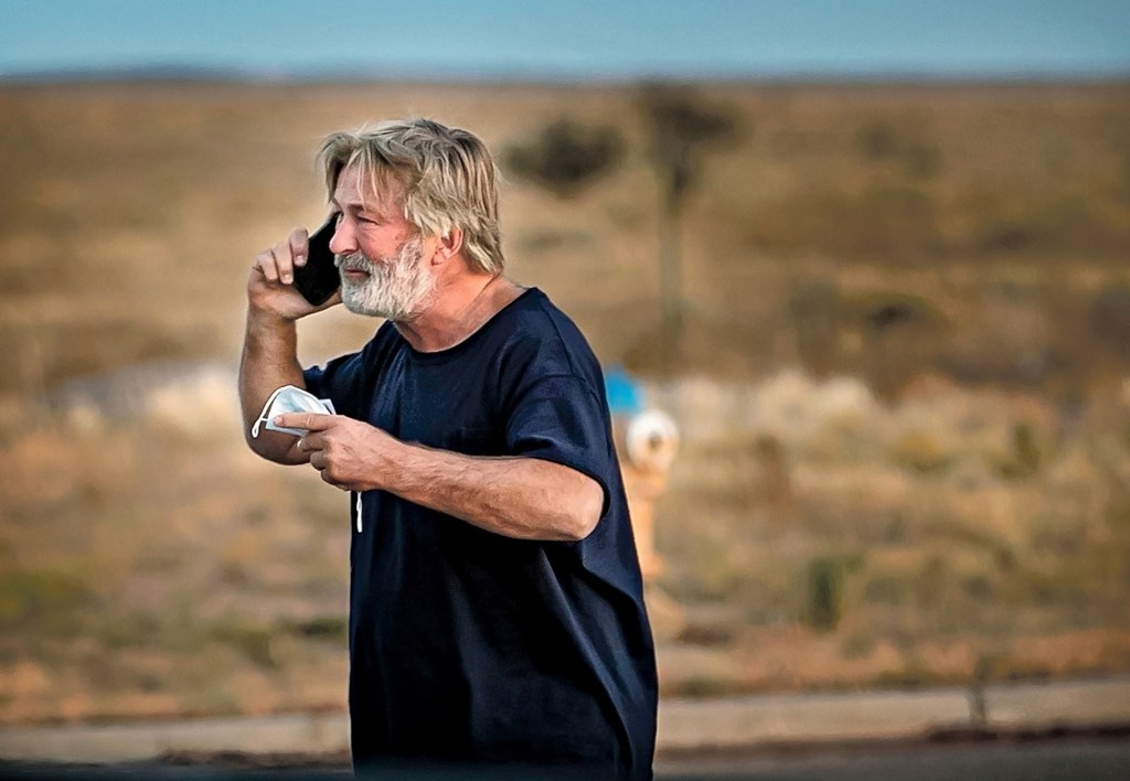 A distraught Alec Baldwin lingers in the parking lot outside the Santa Fe County Sheriff's offices on Camino Justicia after being questioned on Oct. 20, 2021 about a shooting when a prop gun misfired earlier in the day on a local movie set.