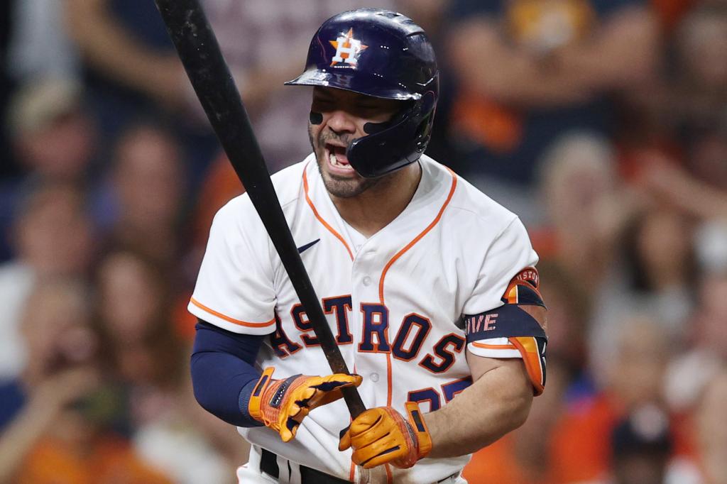 Jose Altuve #27 of the Houston Astros reacts after striking out against the Boston Red Sox during the fifth inning in Game Six of the American League Championship Series at Minute Maid Park on October 22, 2021 in Houston, Texas.