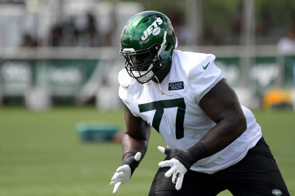 Jets offensive tackle Mekhi Becton (77) during practice.