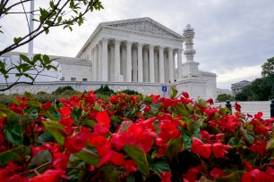 In this Oct. 4, 2021 photo, the Supreme Court is seen on the first day of the new term, in Washington.