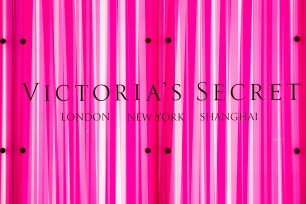 Victoria's Secret logo seen on a hot-pink background