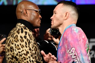 Kamaru Usman (left) and Colby Covington (right) face off ahead of their title fight Saturday night.