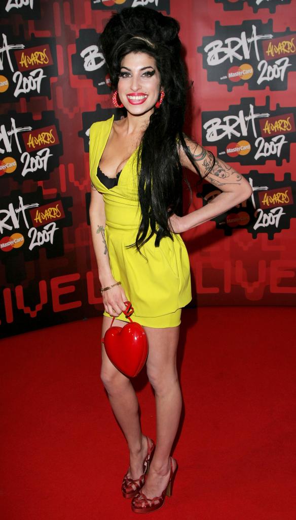 Winehouse's red Moschino heart shaped bag she wore to the BRIT Awards in 2007 is expected to fetch $15,000 to $20,000.